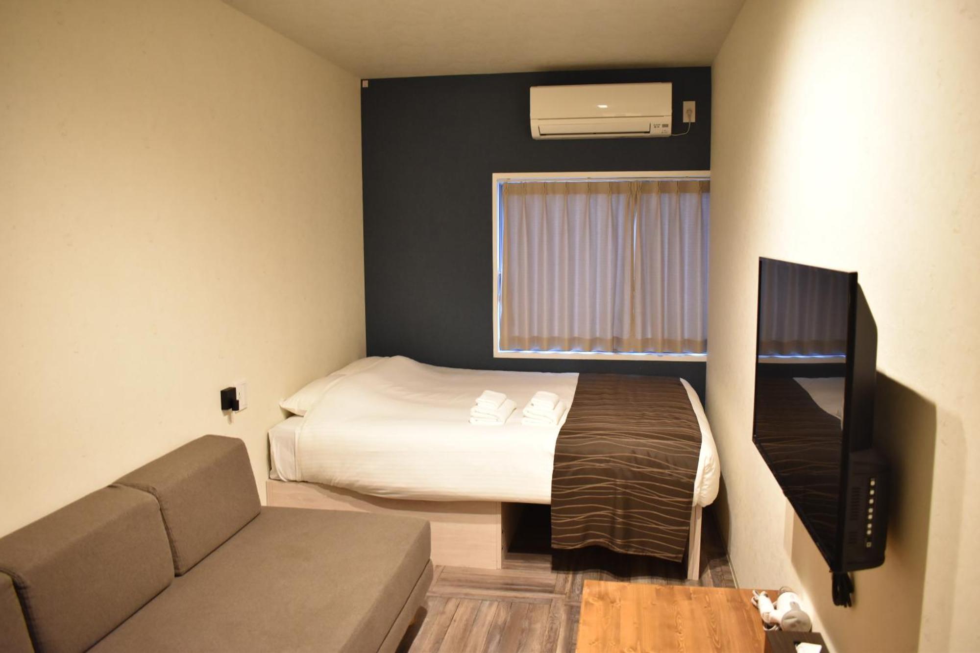 מלון אוסקה Shinsaibashi House חדר תמונה